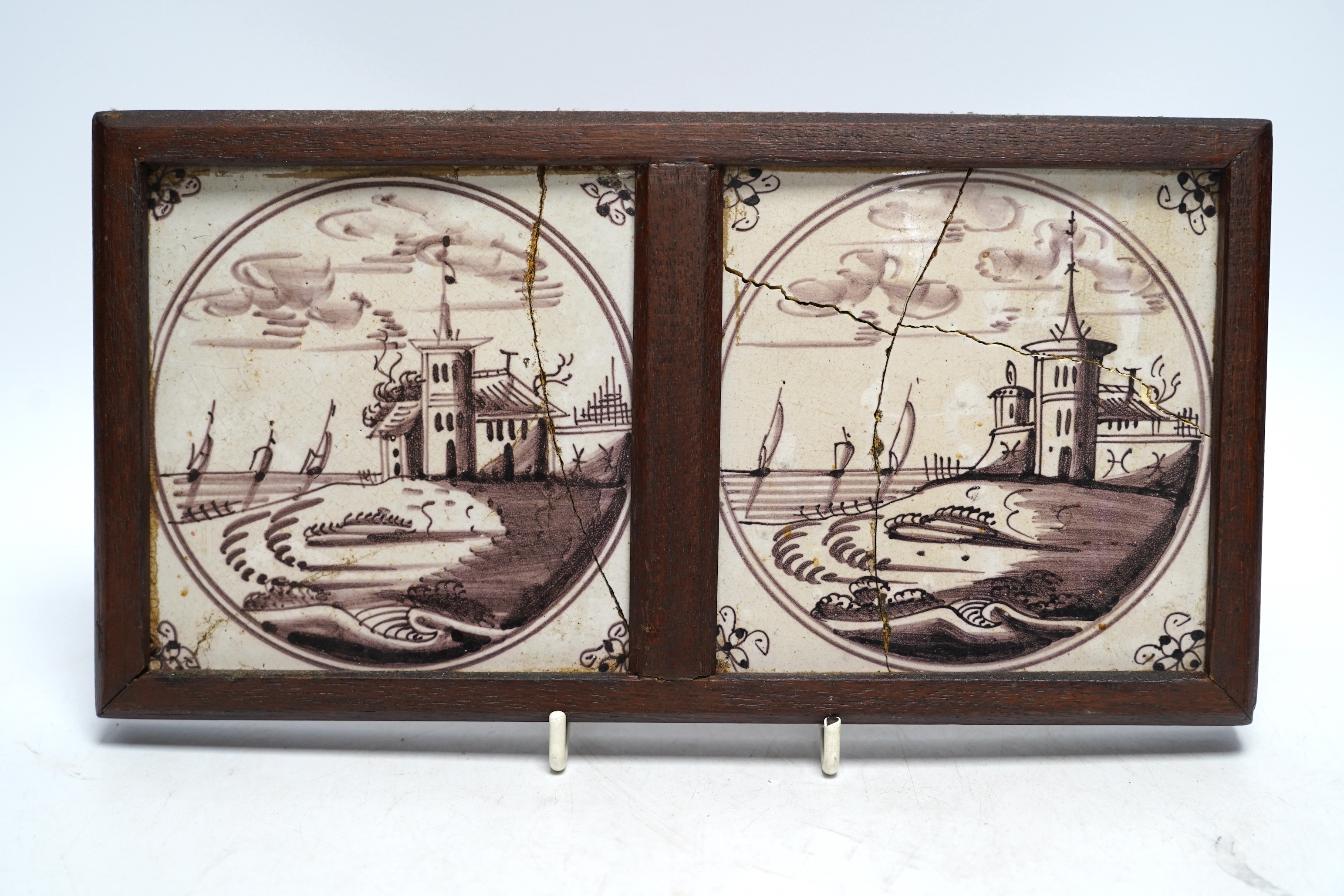 An 18th century Delft polychrome plate, 23cm diameter, and two framed tiles. Condition - tiles poor, plate with usual chipping to edges
